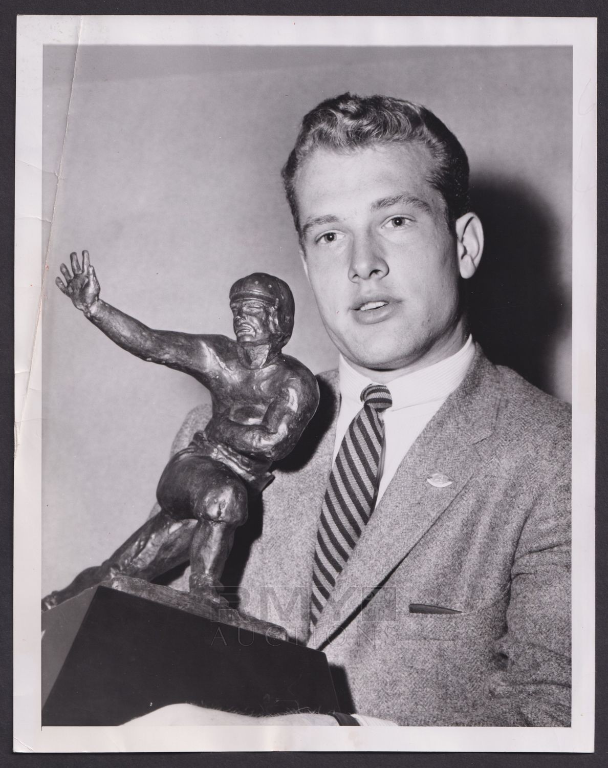 Lot 255 1956 paul hornung notre dame star poses with heisman trophy 